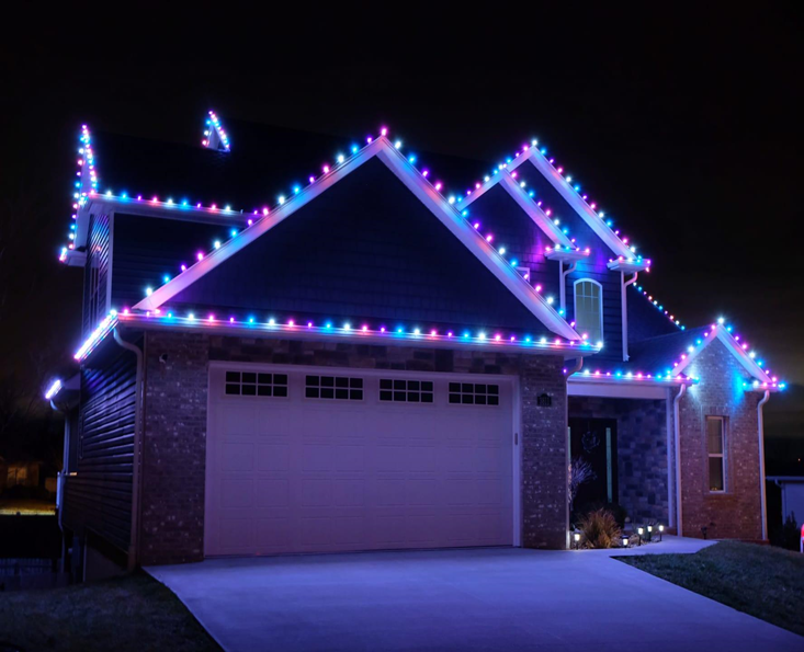 Home lit in blue and pink